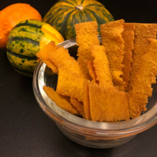 south-indian-rice-chips-pumpkin-spice-product-shown-next-to-decorative-pumpkins-2